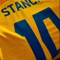 Romania's home football jersey for 2025-26 Fan version